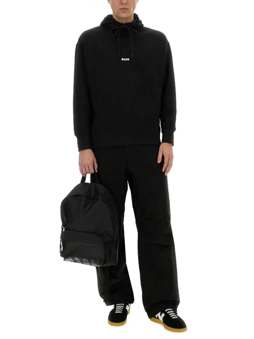 Black Hoodie With Adjustable Drawstring And Subtle Logo